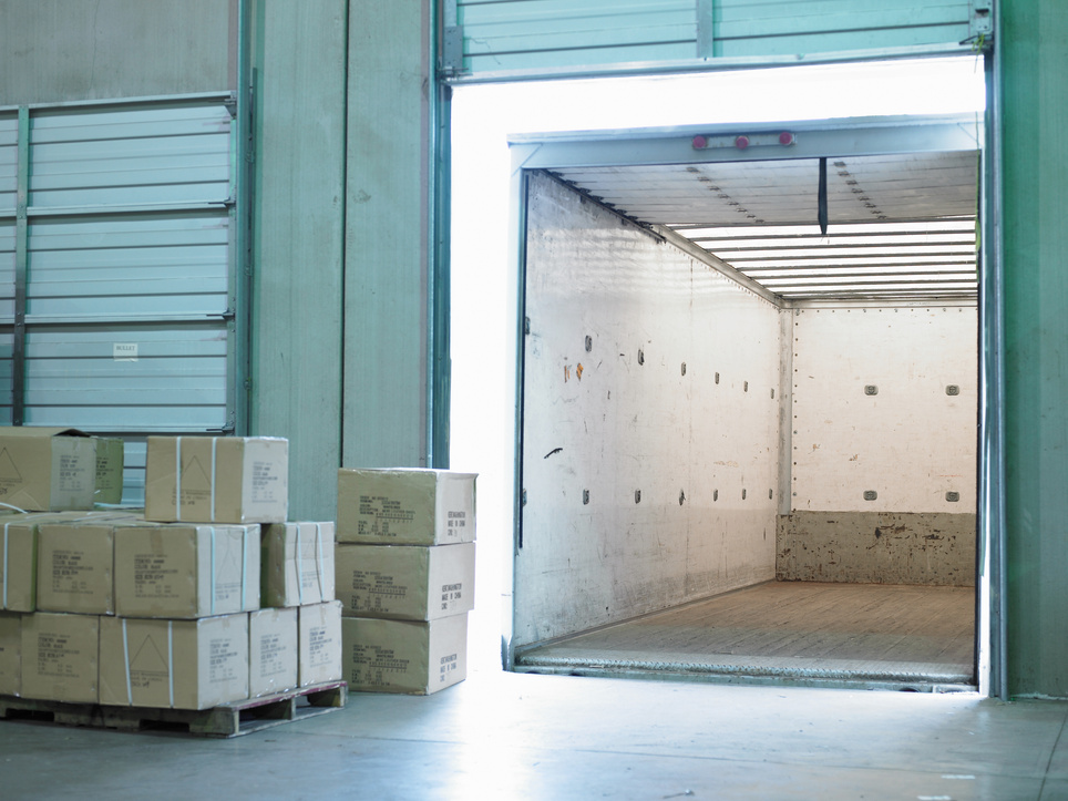 Empty semi-truck at loading dock